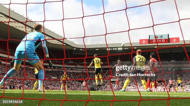 Max Power of Sunderland breaks the deadlock, heading in the first goal during the Sky Bet League One match between Sunderland and Scunthorpe United...