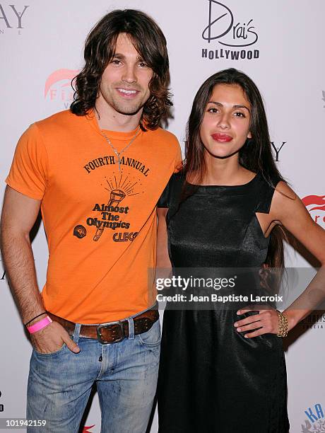 Justin Gaston and Giglianne Braga attend the Runway Magazine Summer 2010 Issue Release Party at Drai's Hollywood on June 9, 2010 in Hollywood,...