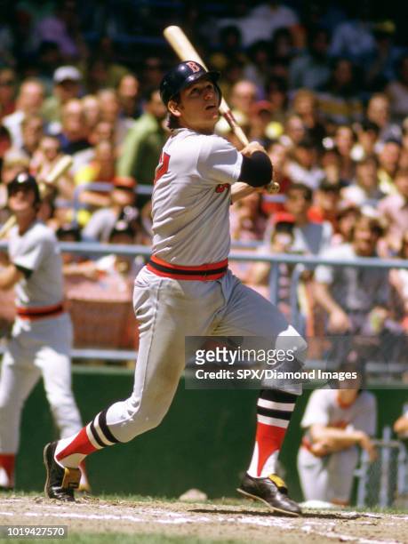Carlton Fisk, of the Boston Red Sox, at bat during a game from his 1973 season. Carlton Fisk played for 24 years with 2 different teams , was a...