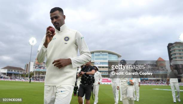 Hardik Pandya of India holds up the ball as his leaves the field after taking a five wicket haul during day two of the Specsavers 3rd Test match...