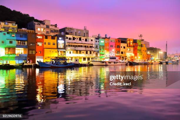 bright colored buildings in zhengbin fishing port, keelung , taiwan - hollywood blvd stock pictures, royalty-free photos & images