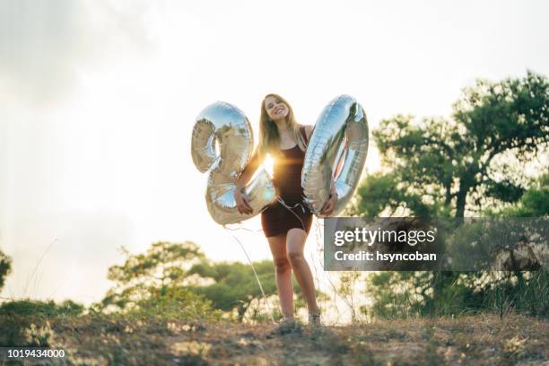 young woman celebrates a twenty years birthday - 20 24 years stock pictures, royalty-free photos & images