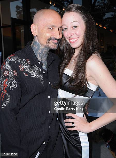 Actor Robert LaSardo and Danielle Kasen attend Venice Magazine's event at the opening of Haro Gallery on June 9, 2010 in Culver City, California.