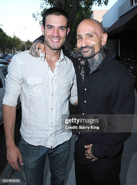 Actor/model Marcio Romani and actor Robert LaSardo attend Venice Magazine's event at the opening of Haro Gallery on June 9, 2010 in Culver City,...