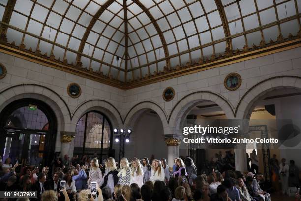 Models walk the runway at the Line of Oslo show during Oslo Runway SS19 at Bankplassen 4 on August 15, 2018 in Oslo, Norway.