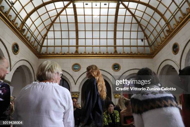 Model walks the runway at the Line of Oslo show during Oslo Runway SS19 at Bankplassen 4 on August 15, 2018 in Oslo, Norway.