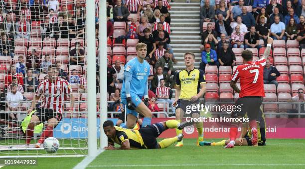 Chris Maguire of Sunderland back heals the ball in for the third goal during the Sky Bet League One match between Sunderland and Scunthorpe United at...