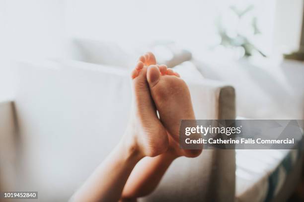 older child's feet - kids white socks stock pictures, royalty-free photos & images