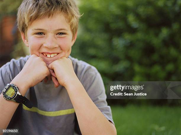 boy (10-12) smiling, portrait - boy 10 11 stock pictures, royalty-free photos & images