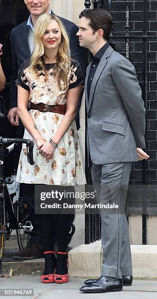 Fearne Cotton and Jimmy Carr pose at Number 10 Downing Street for Sport Relief visit at Downing Street on March 16, 2010 in London, England.