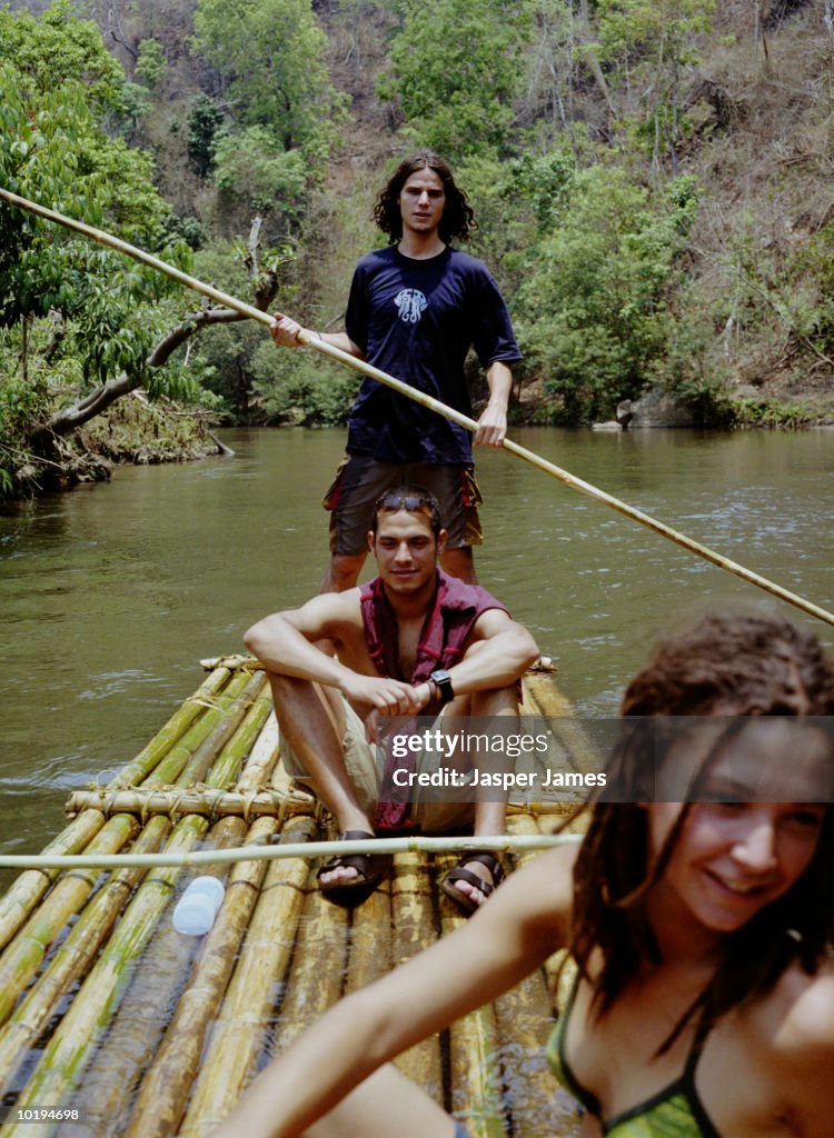 Person Riding Raft Young People Riding Raft On River Through Forest Thailand High-Res ...
