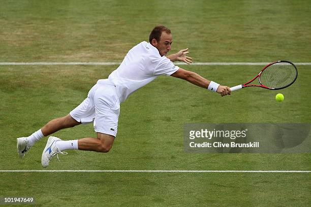 Dudi Sela of Israel dives to win match point during his third round match against Andy Roddick of USA on Day 4 of the the AEGON Championships at...
