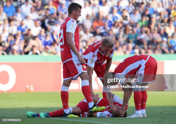 August 19: Grischa Proemel, Florian Huebner, Felix Kroos of 1 FC Union Berlin and Simon Hedlund of 1 FC Union Berlin during the game between FC Carl...