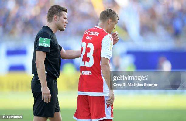 August 19: Referee Dr. Felix Brych and Felix Kroos of 1 FC Union Berlin during the game between FC Carl Zeiss Jena and Union Berlin at the...