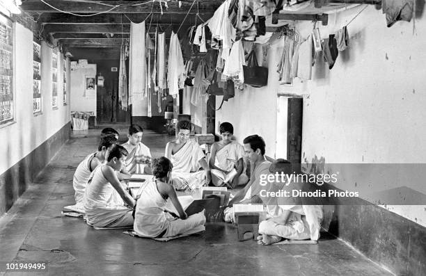 Boys reading books in Gurukul, India, circa 1965.