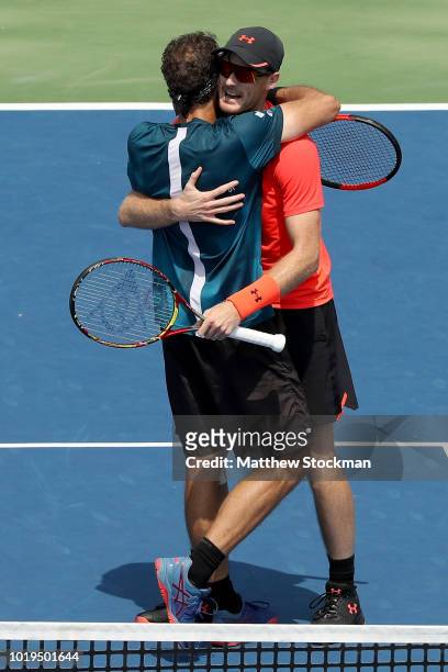 Bruno Soares of Brazil and Jamie Murray of Great Britain celebrate match point against Juan Sebastian Cabal and Robert Farah of Colombia during the...