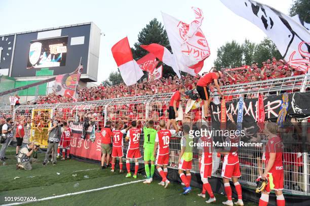 The players of Union Berlin acknowledge the fans after the game between FC Carl Zeiss Jena and Union Berlin at the Ernst-Abbe-Sportfeld on august 19,...