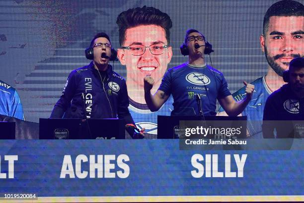 Patrick 'Aches' Price and Justin 'Silly' Fargo, both of Evil Geniuses, celebrate after defeating Team Kaliber to advance to the Grand Finals of the...