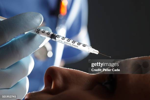 botox injections - botox injection stock pictures, royalty-free photos & images