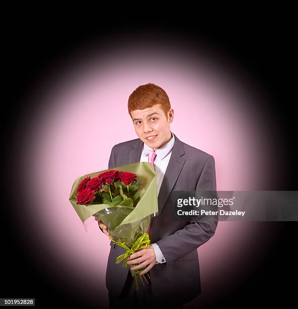 teenager with roses through spy hole - blind date stock pictures, royalty-free photos & images