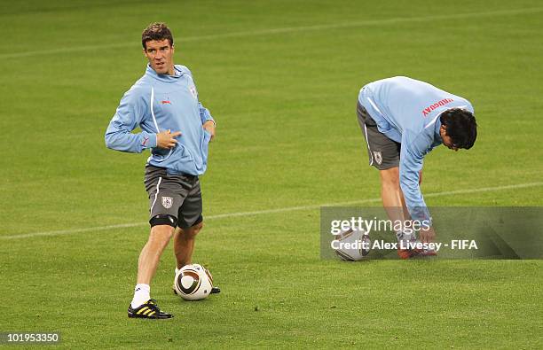 Andres Scotti of Uruguay stretches during the Uruguay training session ahead of the 2010 FIFA World Cup South Africa at Green Point stadium on June...
