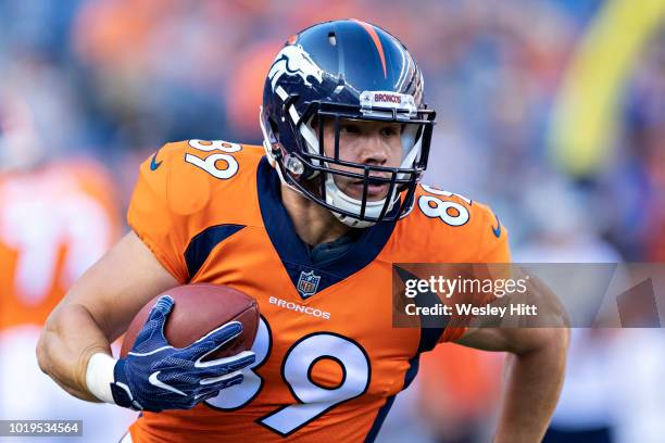 Brian Parker of the Denver Broncos warming up before a game against the Minnesota Vikings during week one of preseason at Broncos Stadium at Mile...