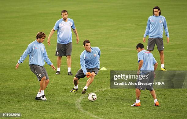 Andres Scotti of Uruguay in action during the Uruguay training session ahead of the 2010 FIFA World Cup South Africa at Green Point stadium on June...