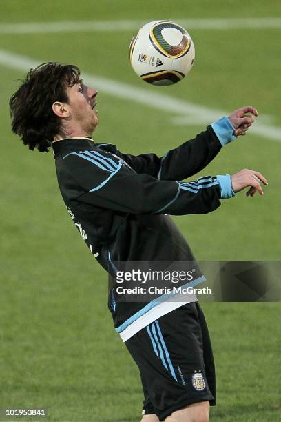 Lionel Messi of Argentina's national football team handles the ball during a team training session on June 10, 2010 in Pretoria, South Africa.