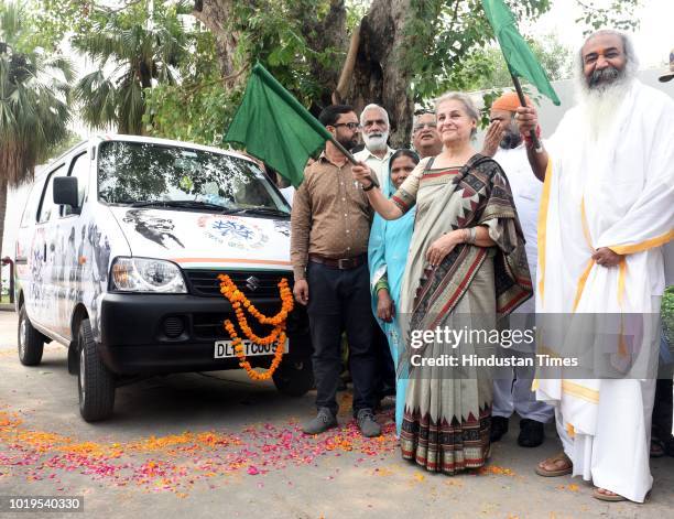 Acharya Pramod Krishnam, with social worker and former member of the planning commission Syeda Saiyidain Hameed during the inauguration of Mobile...