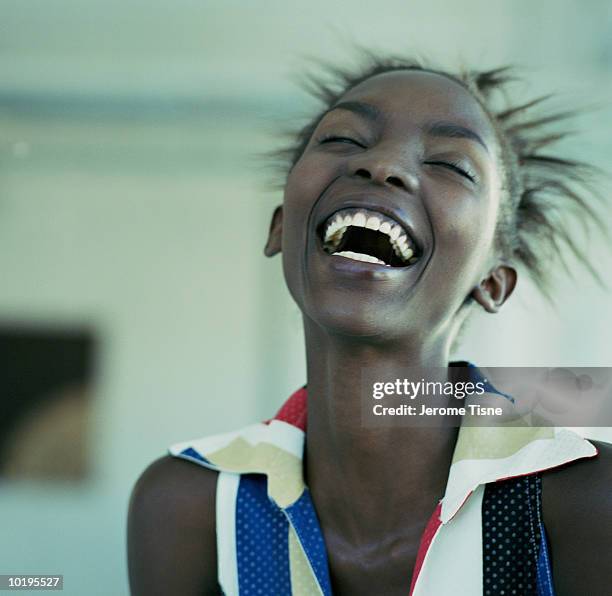 young woman laughing - huvudet bakåt bildbanksfoton och bilder