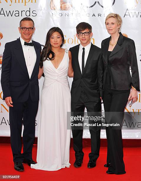 Producer Dante Di Loreto, Actors Jenna Ushkowitz, Kevin Mchale and Jane Lynch arrive at the Closing Ceremony of the 2010 Monte Carlo Television...