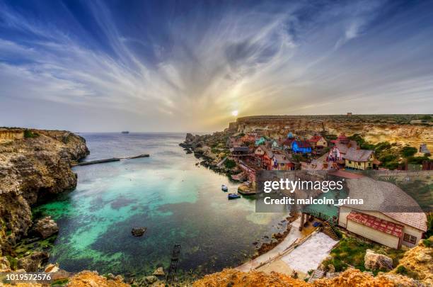 popeye village and anchor bay, mellieha, malta - malta stock pictures, royalty-free photos & images