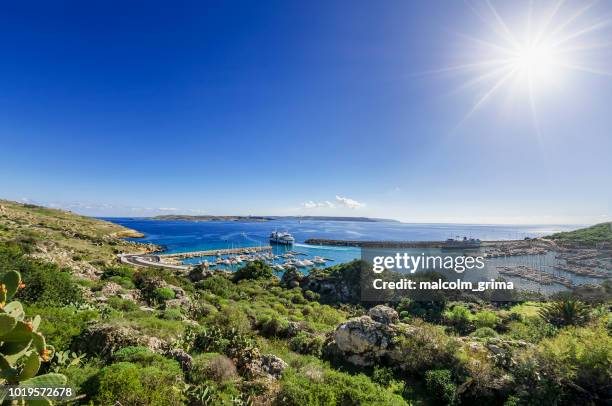 mgarr harbour, gozo on a clear winter day - gozo stock-fotos und bilder