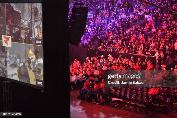 Fans watch the competition on large screens during the 2018 Call of Duty World League Championship at Nationwide Arena on August 19, 2018 in...