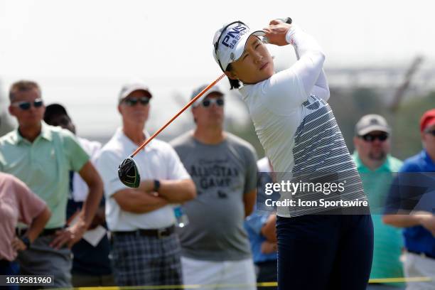 Golfer Amy Yang tees off at the first hole during the final round of the Indy Women In Tech on August 19, 2018 at the Brickyard Crossing Golf Club in...