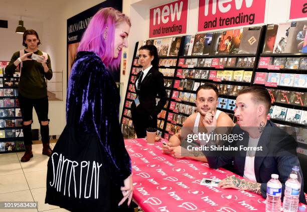 Isaac Holman and Laurie Vincent of Slaves perform live and sign copies of their new album 'Acts of Fear and Love' during an instore session at HMV...
