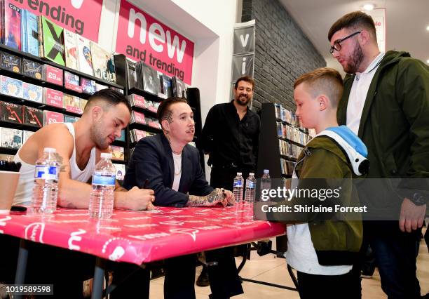 Isaac Holman and Laurie Vincent of Slaves perform live and sign copies of their new album 'Acts of Fear and Love' during an instore session at HMV...