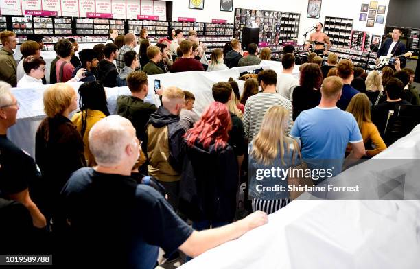 Isaac Holman and Laurie Vincent of Slaves perform live and sign copies of their new album 'Acts of Fear and Love' during an instore session at HMV...