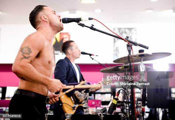 Isaac Holman and Laurie Vincent of Slaves perform live and sign copies of their new album 'Acts of Fear and Love' during an instore session at HMV...