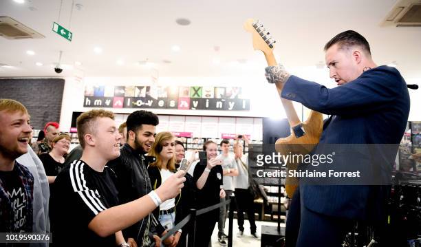 Laurie Vincent of Slaves performs live and signs copies of their new album 'Acts of Fear and Love' during an instore session at HMV Manchester on...