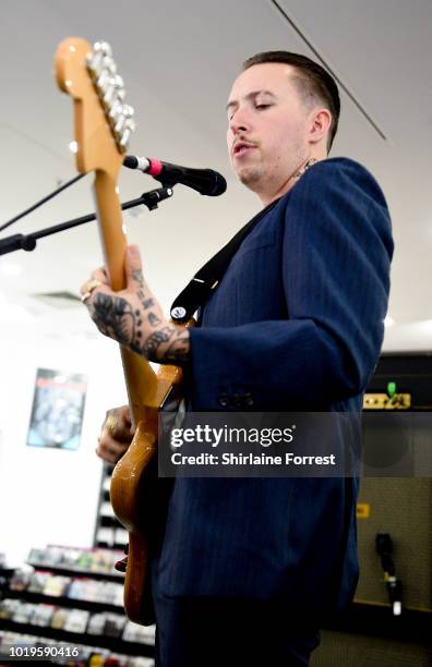 Laurie Vincent of Slaves performs live and signs copies of their new album 'Acts of Fear and Love' during an instore session at HMV Manchester on...