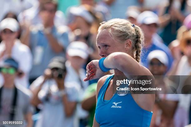 Kiki Bertens of the Netherlands cries tears of joy after her win over Simona Halep of Romania during the women's final on Day 8 of the Western and...