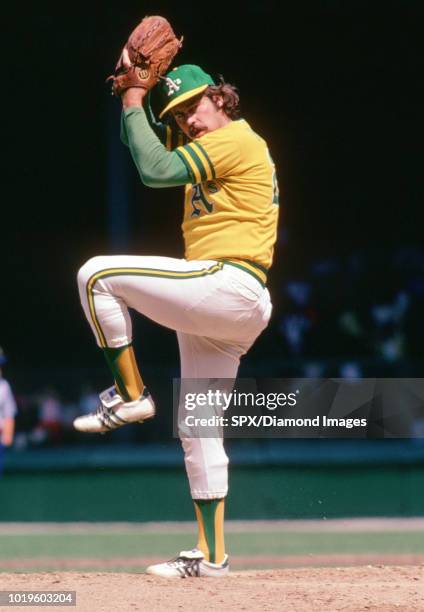 Catfish Hunter of the Oakland Athletics pitching during a game from his 1974 season with the Oakland A's. Catfish Hunter played for 15 years with 2...