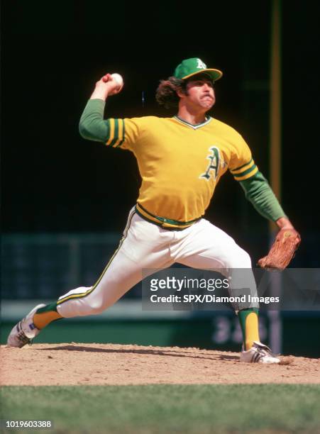 Catfish Hunter of the Oakland Athletics pitching during a game from his 1974 season with the Oakland A's. Catfish Hunter played for 15 years with 2...