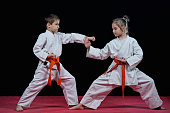 Children are training karate blows