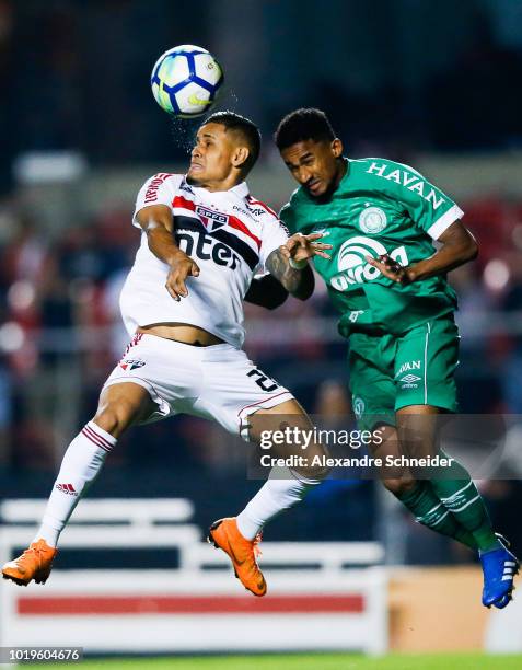 Everton of Sao Paulo and Eduardo of Chapecoense head for the ball during the match for the Brasileirao Series A 2018 at Morumbi Stadium on August 19,...