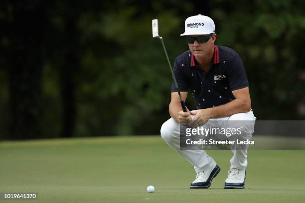 Brian Gay lines up a putt on the 14th green during the final round of the Wyndham Championship at Sedgefield Country Club on August 19, 2018 in...