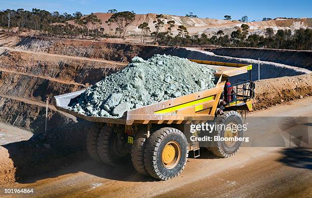 Truck carries nickel ore out of Western Areas NL's Tim King Pit open-cut nickel mine at Spotted Quoll, in Forrestania, Western Australia, on...