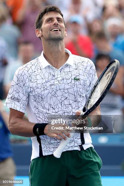 Novak Djokovic of Serbis celebrates his win over Roger Federer of Switzerland during the men's final of the Western & Southern Open at Lindner Family...