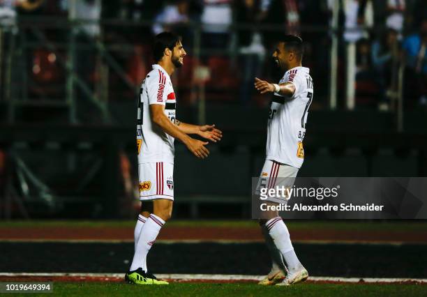 Hudson of Sao Paulo celebrates with teammate after scoring the second goal of his team during the match between Sao Paulo and Chapecoense for the...